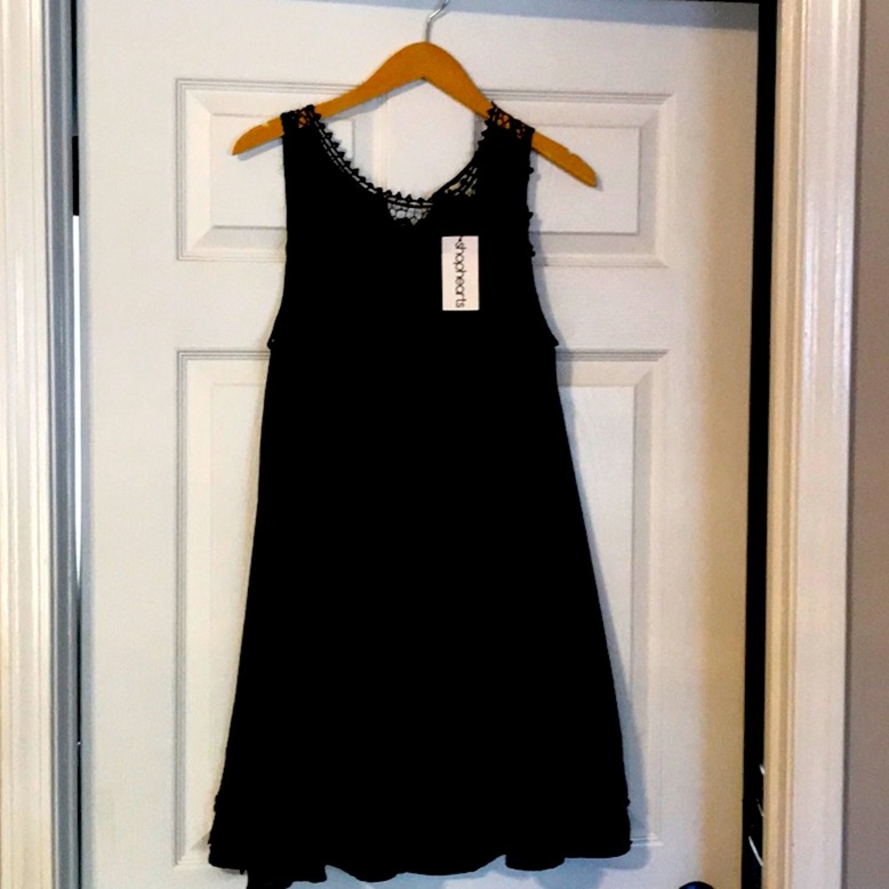 Size small black dress with tags.